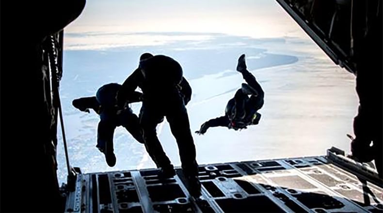 Navy Leap Frogs jump from a Blue Angels C-130 Hercules aircraft. (Contributed photo)