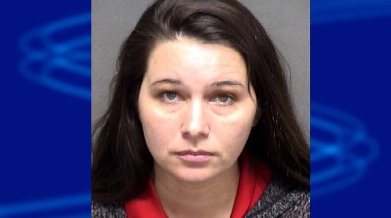 Amanda Guevara is accused of striking her son with an extension cord after putting him in handcuffs.