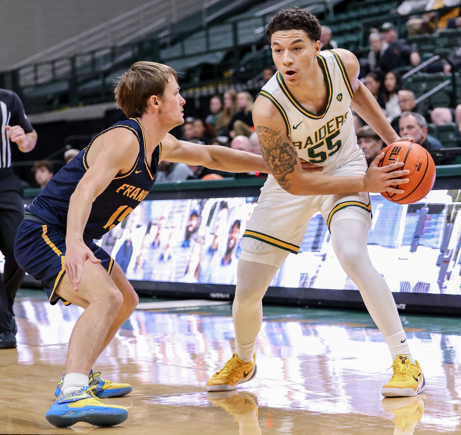 Wright State freshman guard Michael Cooper looks to pass during an 86-37 win over Franklin College 86-37 in a season opener on Monday, Nov. 3 at Ervin J. Nutter Center in Fairborn. BRYANT BILLING/STAFF