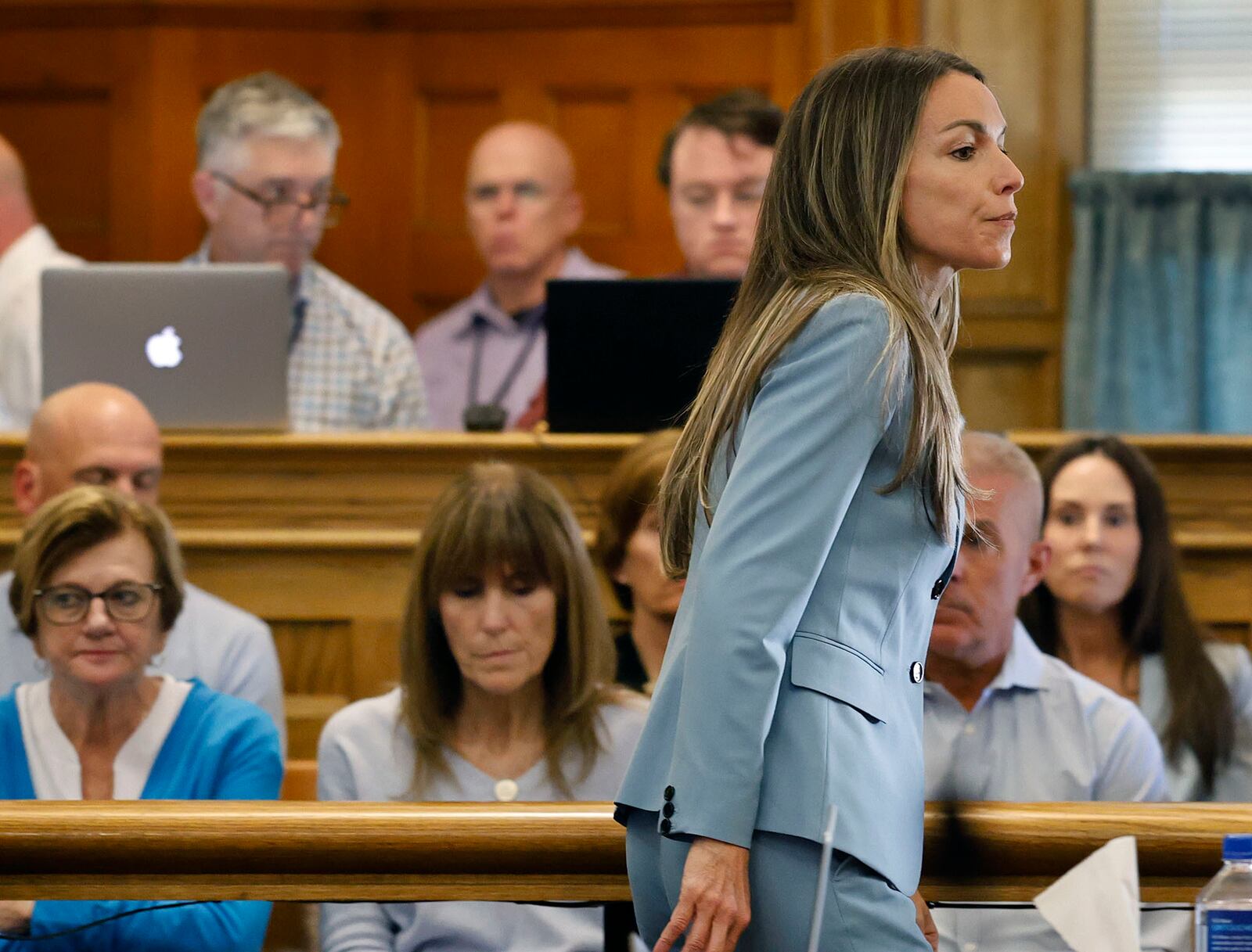 Defendant Karen Read approaches the judge for a sidebar discussion with her lawyers during her murder trail in Norfolk Superior Court in Dedham, Mass., Wednesday, April 30, 2025. (Greg Derr/The Patriot Ledger via AP, Pool)
