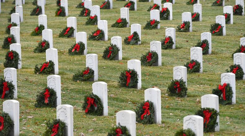 Wreaths were placed at the Veterans Cemetery at Mountain Home in Johnson City, Tenn., during the annual Wreaths Across American event on Saturday, Dec. 18, 2021. (David Crigger /Bristol Herald Courier via AP)