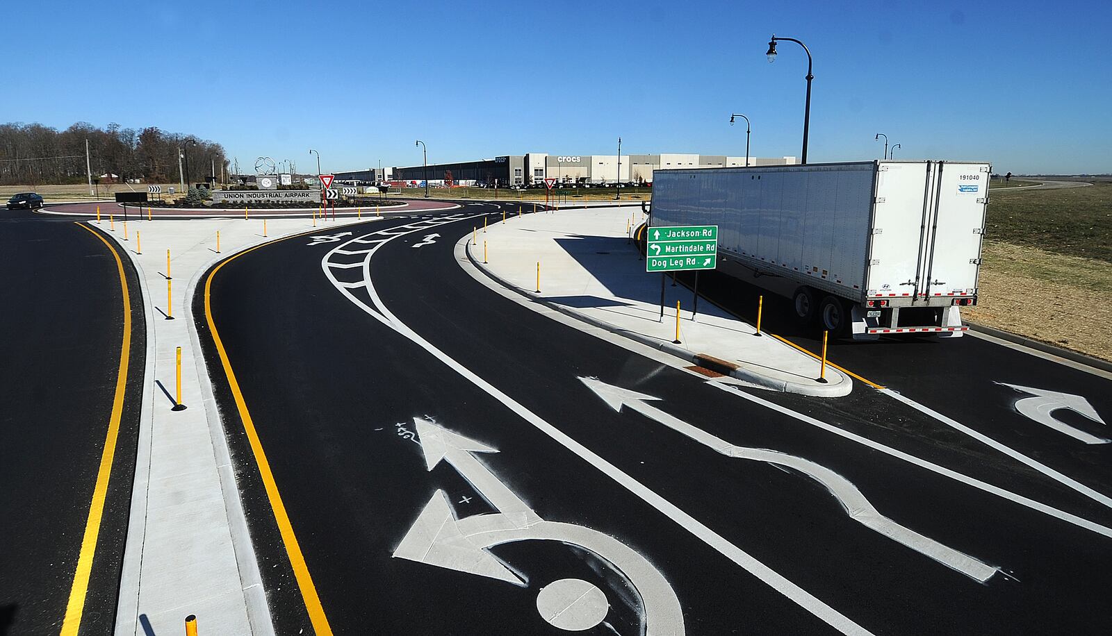 The newly constructed roundabout at Union Airpark Blvd. and Dog Leg Road near the Dayton International Airport is designed to improve truck traffic flow through the commercial development in the area. MARSHALL GORBY\STAFF