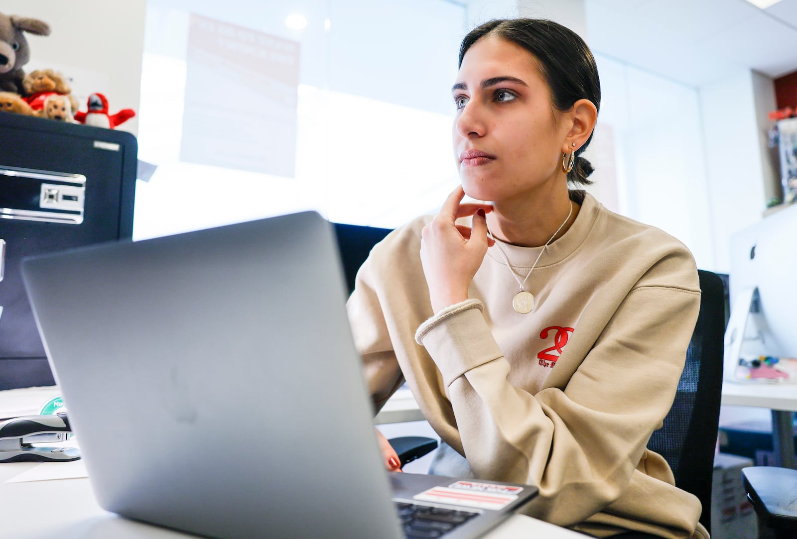 Olivia Patel, Editor-in-Chief of The Miami Student newspaper, talks to fellow editor in the newsroom in Armstrong Student Center Tuesday, Feb. 24, 2026 at Miami University in Oxford. The student-produced newspaper is celebrating its 200th anniversary. NICK GRAHAM/STAFF