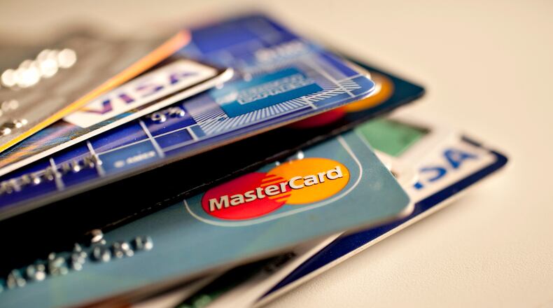 Shoppers racked up more debt this year than last during the holidays. Daniel Acke, Bloomberg