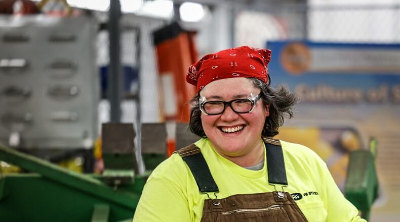 Air Force veteran and sheet metal apprentice Santana Austin said she always liked building things and hopes to become a sheet metal worker in the future. JIM NOELKER/STAFF