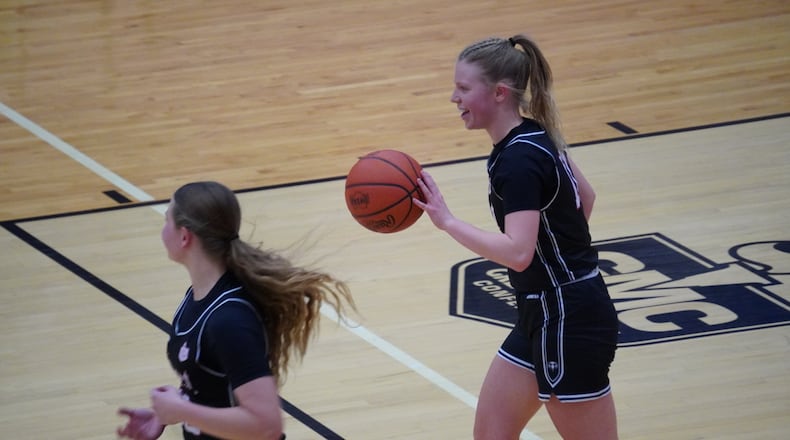 Lakota West’s Caroline Bayliff brings the ball up court against Fairfield on Wednesday night. CHRIS VOGT / CONTRIBUTED