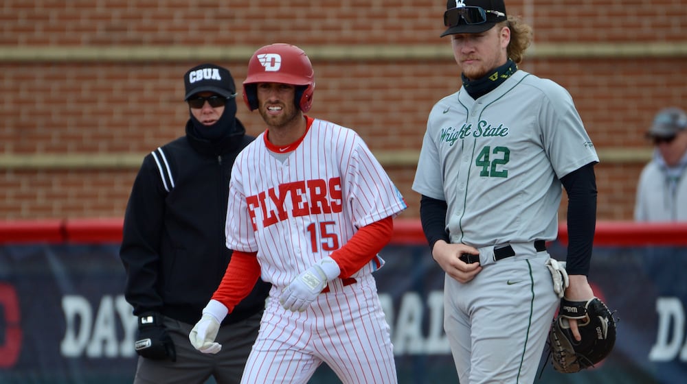 Dayton's Jake Silverstein, left, leads off in front of Wright State first baseman Drew Fleming on Tuesday, April 19, 2022, at Woerner Field in Dayton. Photo courtesy of UD