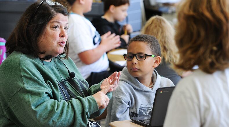 Kettering Oakview Elementary School third-grader Kamdyn Love listens to his teacher Missy Fote during class, Wednesday, May 17, 2023. MARSHALL GORBY\STAFF