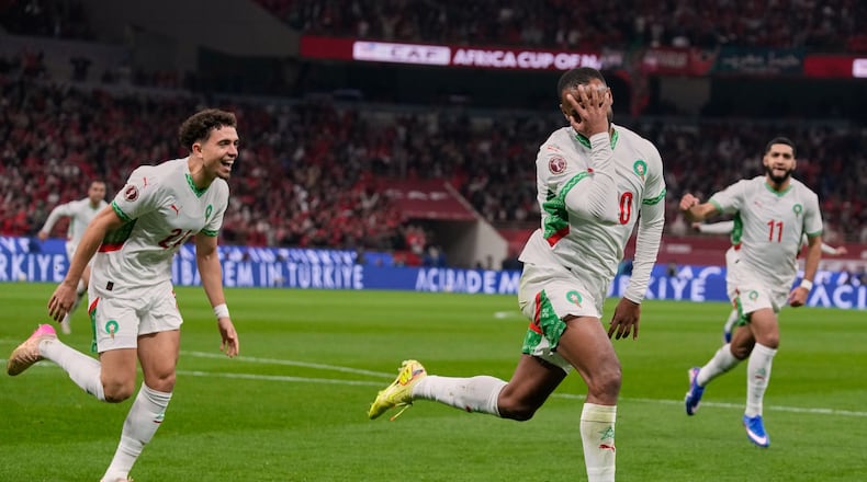 Morocco's Ayoub El Kaabi celebrates after scoring his side's first goal during the Africa Cup of Nations group A soccer match between Zambia and Morocco in Rabat, Morocco, Monday, Dec. 29, 2025. (AP Photo/Themba Hadebe)