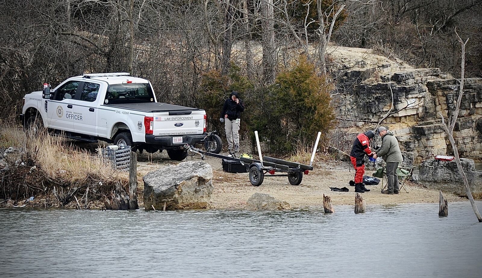 Authorities searched the waters at Madison Lakes in Trotwood on Thursday, Dec. 15, 2022. MARSHALL GORBY / STAFF