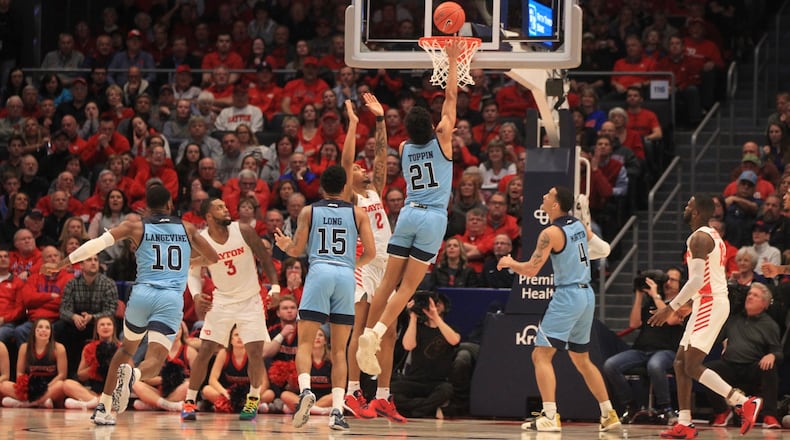 Rhode Island’s Jacob Toppin scores against Dayton on Tuesday, Feb. 11, 2020, at UD Arena. David Jablonski/Staff