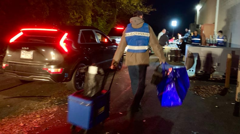 A troop of Boy Scouts helped pack up elections materials at the Greene County Board of Elections as precinct workers returned them the evening of Election Day, Nov. 4, 2025. LONDON BISHOP/STAFF