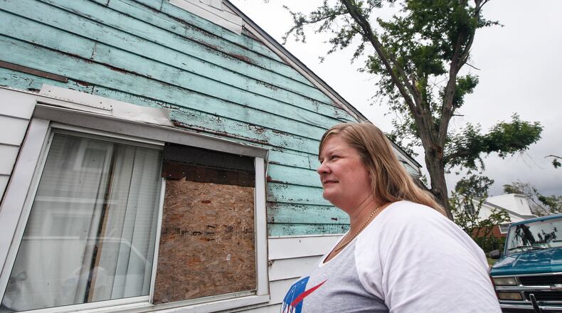Jessica Brady of Harrison Twp. will be one of the first recipients of Federal Home Loan Bank grant money provided for tornado recovery. The bank along with local nonprofit partners announced Wednesday that $5 million in grants will be provided for homeowners to fix or acquire new homes as well as help former renters purchase homes. CHRIS STEWART / STAFF