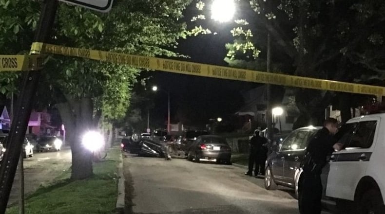 A driver crashed into a tree then rolled onto its top and struck a parked SUV in a crash that caused serious injuries to him and his passenger May 7, 2019, on Pershing Boulevard in Dayton. STAFF FILE