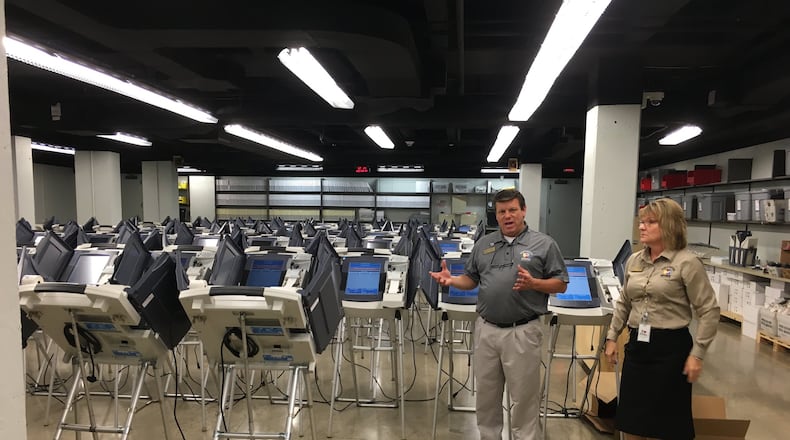 Montgomery County Board of Elections Director Jan Kelly, right, and Deputy Director Steve Harsman, said an Aug. 4 said the cost per ballot was high for a Clay Twp. Fire District levy, the only measure on August's special election ballot. LYNN HULSEY / STAFF