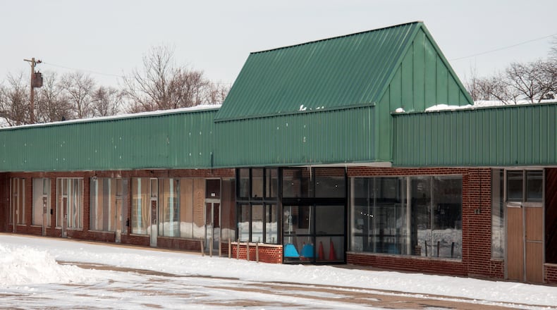 The city of Kettering is planning to demolish part of the Wilmington Heights Shopping Center. The center's owners failed to bring the property up to code after more than 40 compliance visits. BRYANT BILLING / STAFF