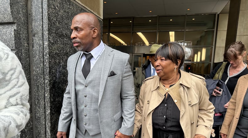 Kenneth Windley, left, leaves a courthouse with his mother, Francina Windley Patterson, in the Brooklyn borough of New York, Monday, March 16, 2026. (AP Photo/Jennifer Peltz)