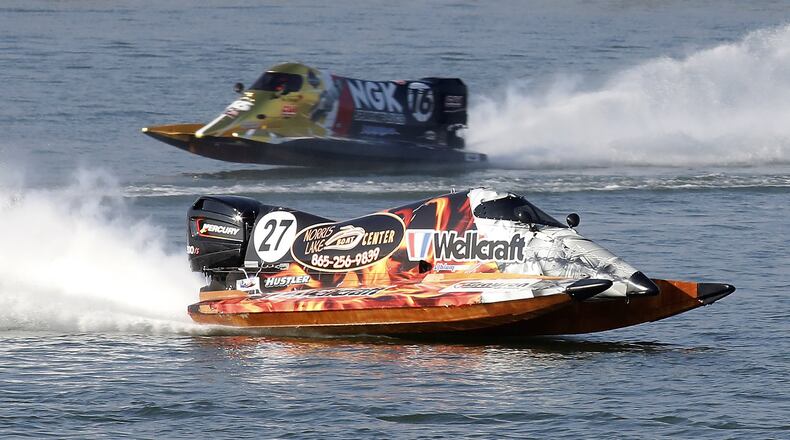 Formula 1 racing boats roar across the lake at the Clark County Fairgrounds in November as Clark County conducts a feasibility study to see if power boat races can be brought to the area. The fairgrounds are moving forward with the plans. Bill Lackey/Staff
