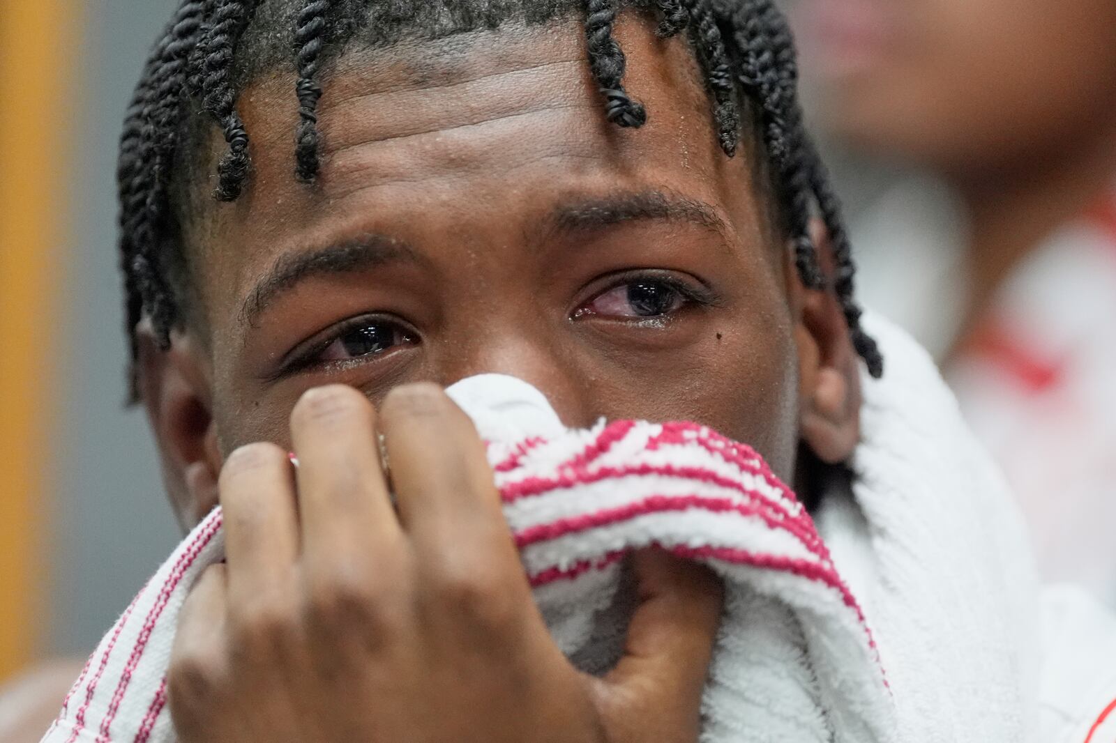 Houston's Kordelius Jefferson sits in the locker room after Florida beat Houston in the national championship at the Final Four of the NCAA college basketball tournament, Monday, April 7, 2025, in San Antonio. (AP Photo/Stephanie Scarbrough)