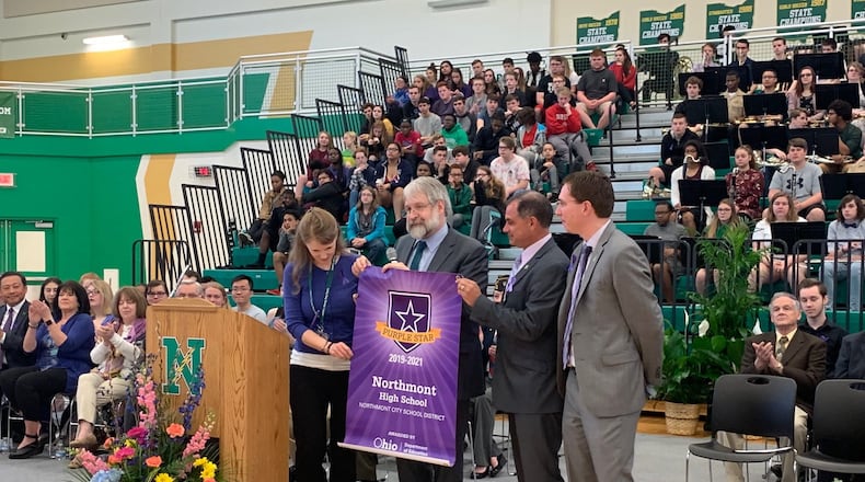 Northmont High School was named a Purple Star School by the Ohio Department of Education on Friday. Left to right: Sheree Coffman, military liason; Paolo DeMaria, ODE Superintendent of Public Instruction; Tony Thomas, Northmont City Schools Superintendent; Jason Inkrott, Principal of Northmont High School. EMILY KRONENBERGER/STAFF PHOTO