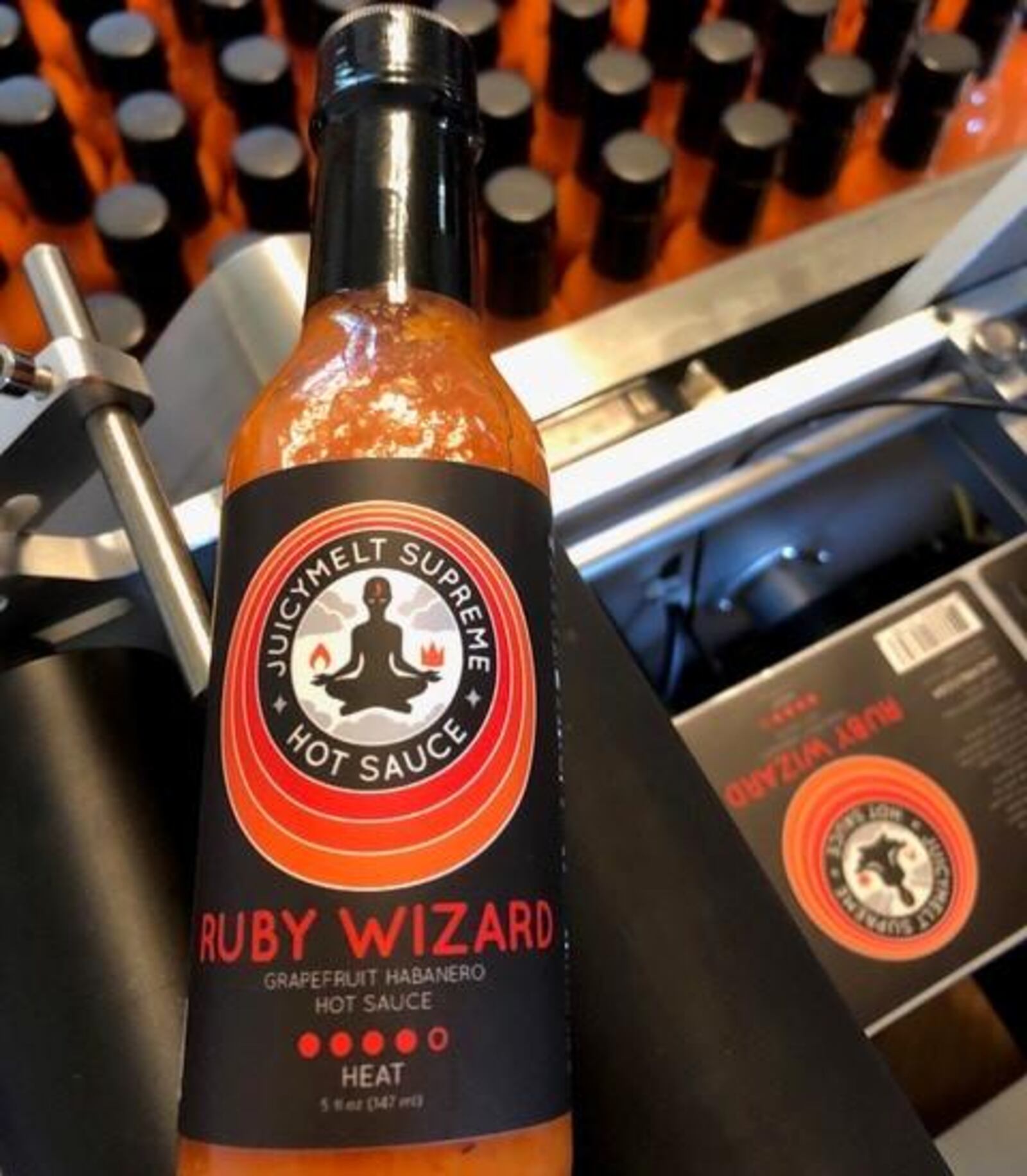 Tracy and Jeffrey McElfresh of Kettering have released JuicyMelt Supreme Hot Sauce.  Varieties include Ruby Wizard (grapefruit habanero), OG Catalyst (orange ginger habanero), and All the Fun (white pepper peach).