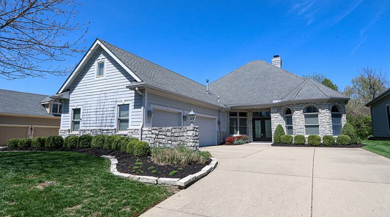 The brick ranch with 4 bedrooms has about 3,070 sq. ft. of living space, including a bonus room above the 3-car garage. CONTRIBUTED PHOTO
