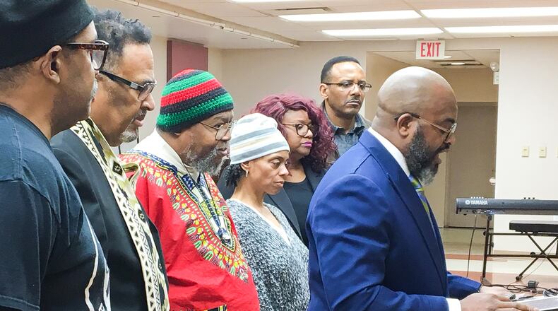 The Rev. Chad White, right, and other leaders of community organizations called Monday for a series of town hall meetings and a peaceful protest to counter a planned May rally in Dayton by a Ku Klux Klan group. CHRIS STEWART / STAFF