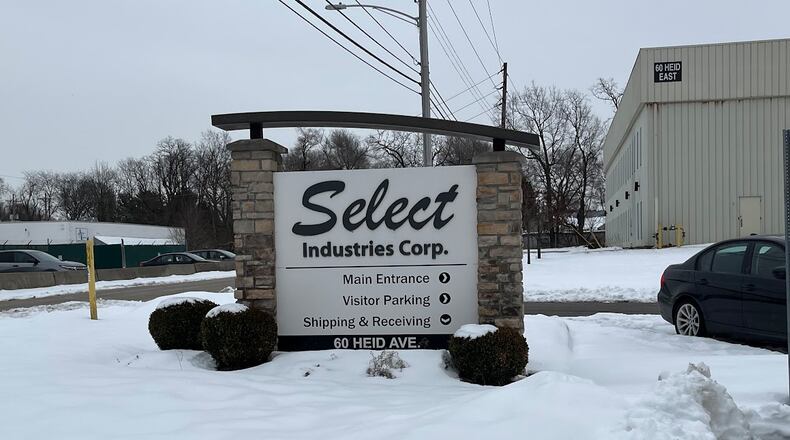 A sign at the visitors parking lot to Select Industries' 60 Heid Ave. plant on Jan. 14, 2025. THOMAS GNAU/STAFF