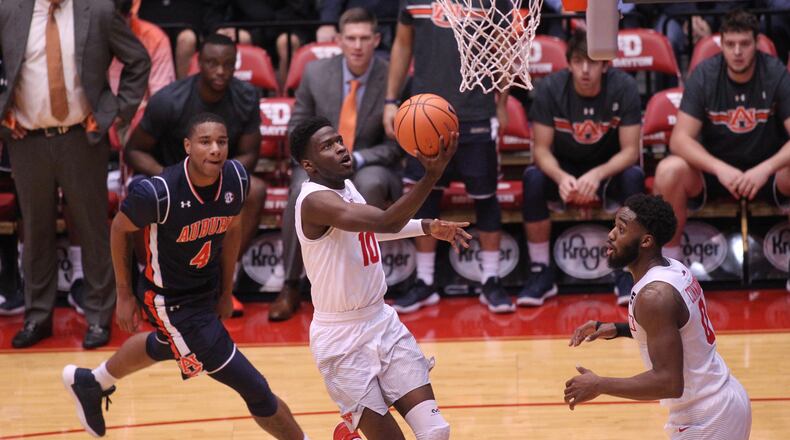 Dayton’s Jalen Crutcher scores against Auburn on Wednesday, Nov. 29, 2017, at UD Arena. David Jablonski/Staff