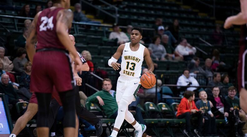 Wright State freshman brings the ball up court during last week’s game vs. Northwestern Ohio. Joseph Craven/CONTRIBUTED