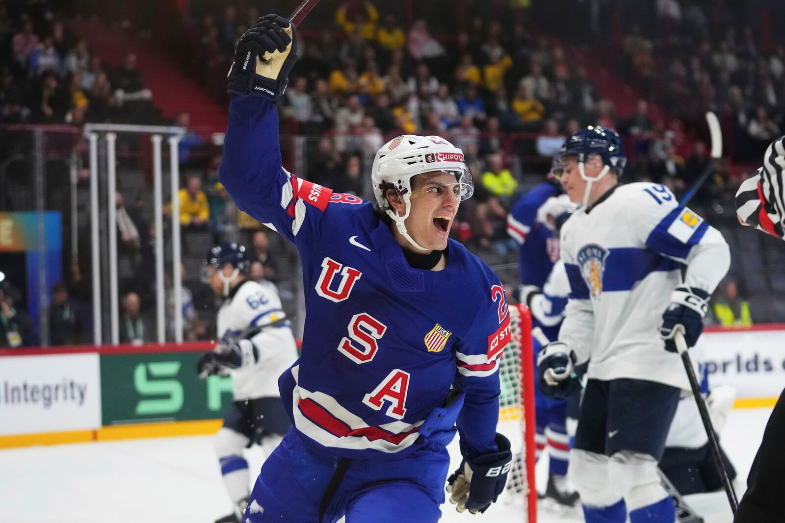 The United States' Zeev Buium celebrates after scoring against Finland during the second period of a quarterfinal match at the ice hockey world championships in Stockholm, Sweden, Thursday, May 22, 2025. (AP Photo/Petr David Josek)