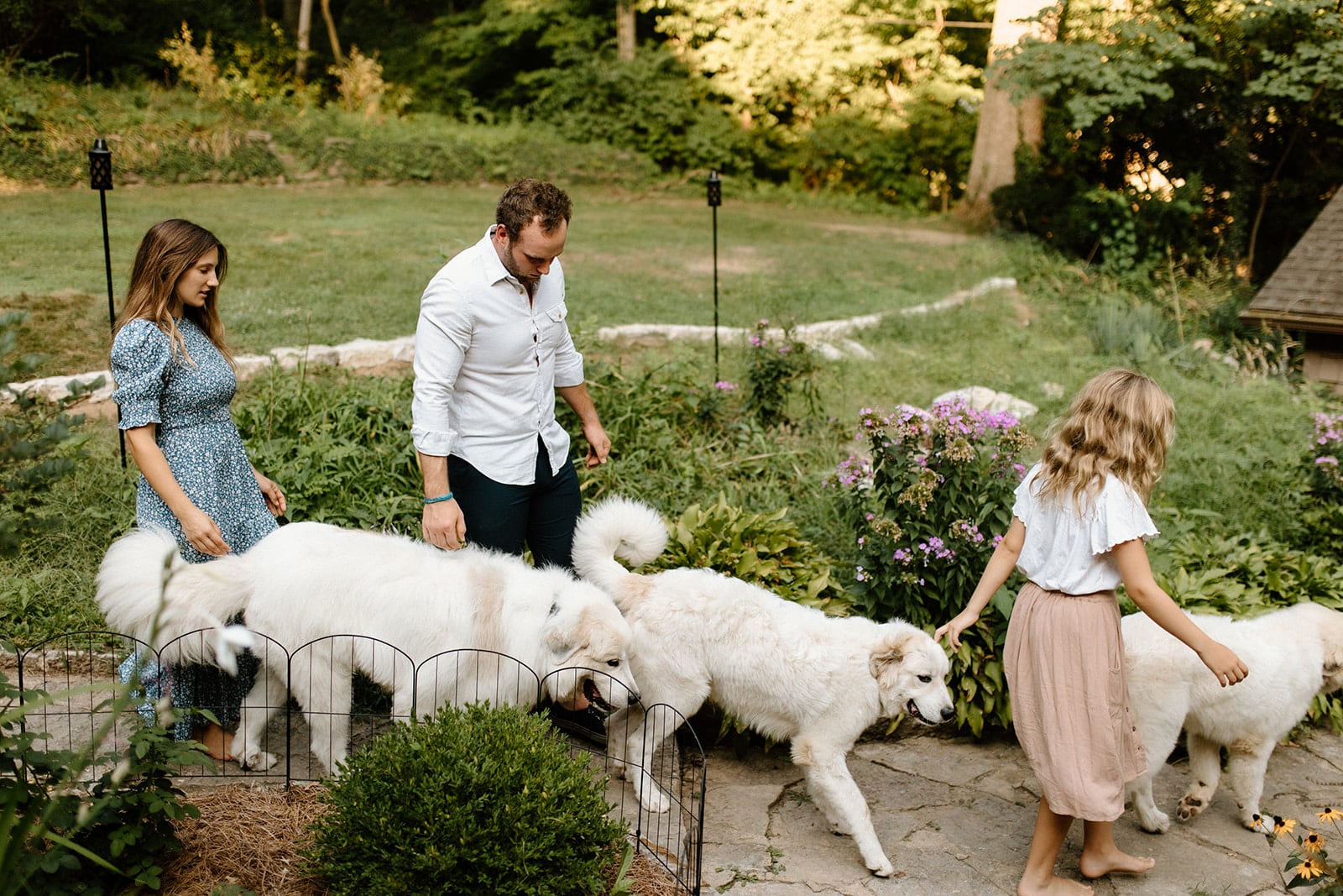 Sarena Kelley (left), her husband and daughter Sophia walk the dogs. Contributed photo