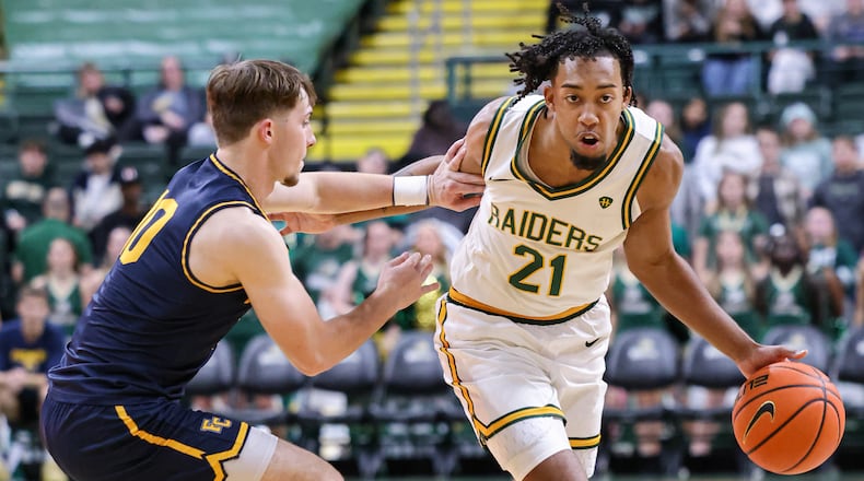 Wright State junior guard Logan Woods dribbles during an 86-37 win over Franklin College 86-37 in a season opener on Monday, Nov. 3 at Ervin J. Nutter Center in Fairborn. BRYANT BILLING/STAFF