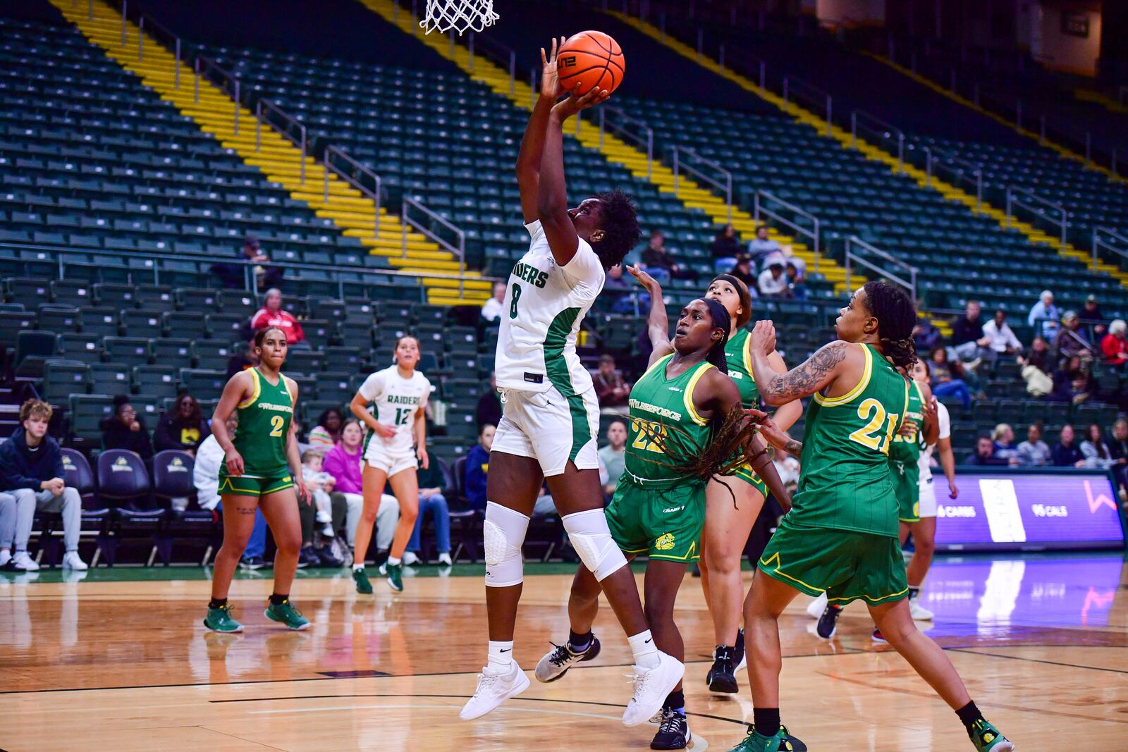 Wright State University's Grace Okih leaps for a layup during their game against Wilberforce on Nov. 12, 2025. JOSEPH R. CRAVEN / CONTRIBUTED PHOTO