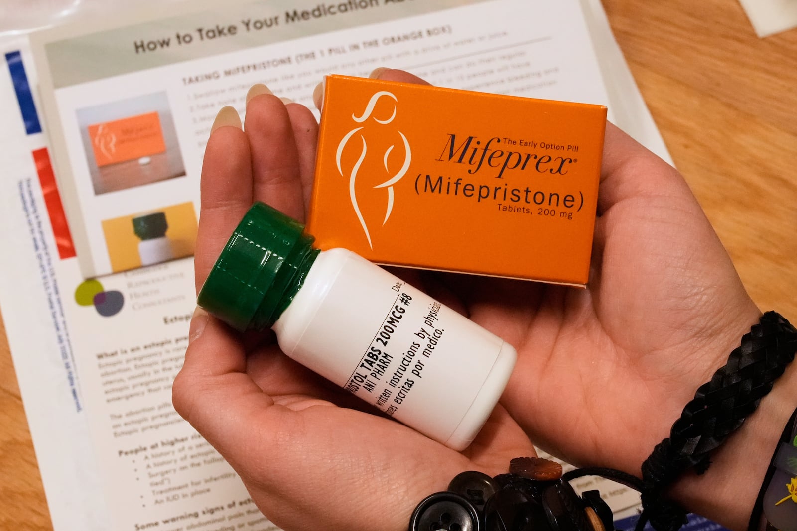 A coordinator shows the medications and care kit, which will be sent out the clients at Massachusetts Medication Abortion Access Project, May 13, 2025, in Somerville, Mass. (AP Photo/Charles Krupa)