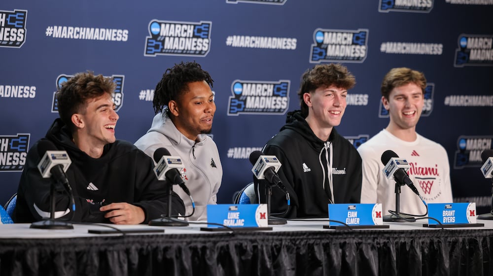 From left to right, Miami's Luke Skaljac, Eian Elmer, Brant Byers and Peter Suder laugh after a question in a news conference on Tuesday, March 17 at University of Dayton Arena. The Redhawks, which are 31-1, will face Southern Methodist University in an NCAA First Four game on Wednesday. BRYANT BILLING / STAFF
