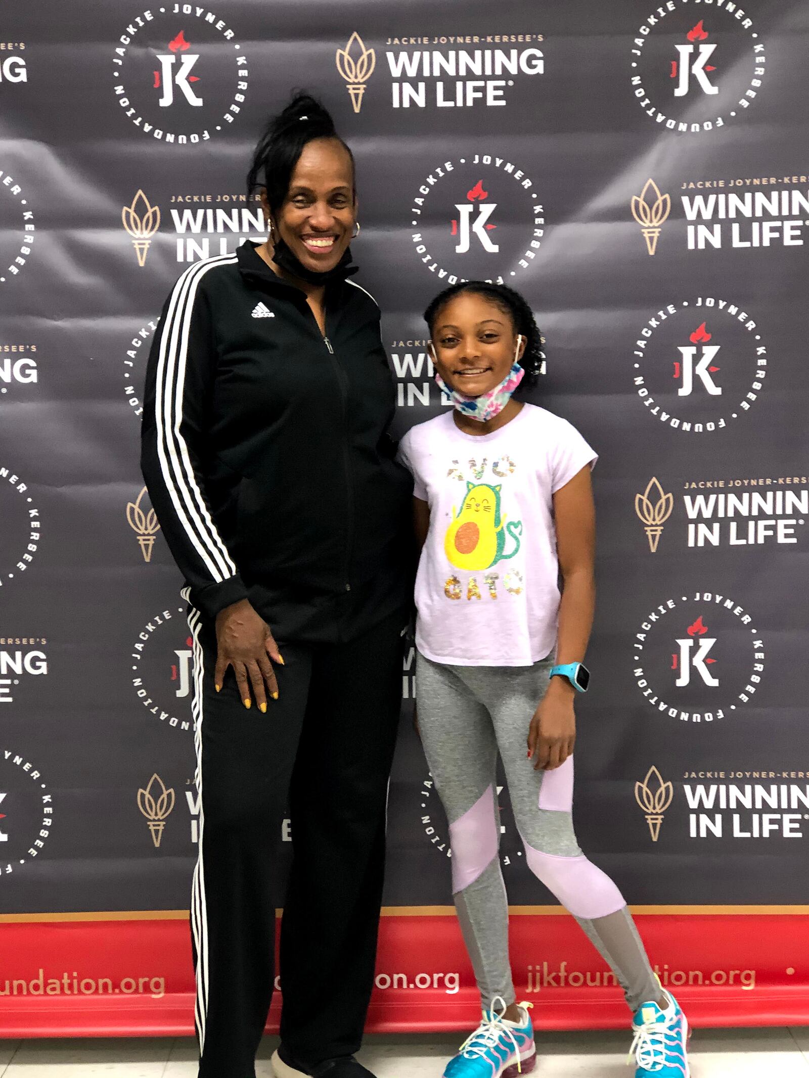Jaiya met four-time Olympian Jackie Joyner Kersee during a track and field competition. Kersee  (L) is now her godmother and a family friend.