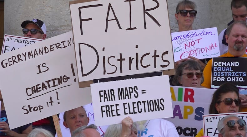 This photo taken from video shows organizers rallying outside of the Ohio Statehouseto protest gerrymandering and advocate for lawmakers to draw fair maps on Wednesday, Sept. 17, 2025, in Columbus, Ohio. (AP Photo/Patrick Aftoora-Orsagos)
