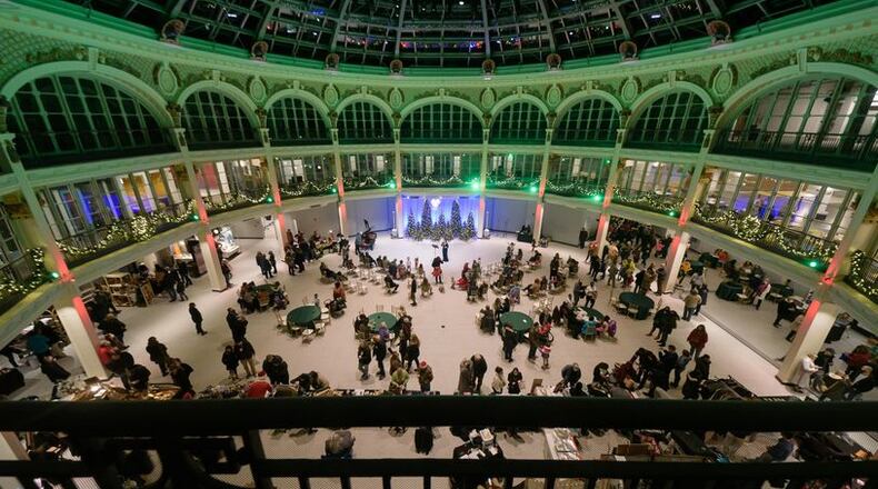 Holly Days returned the Dayton Arcade rotunda area in December 2021. TOM GILLIAM/CONTRIBUTING PHOTOGRAPHER