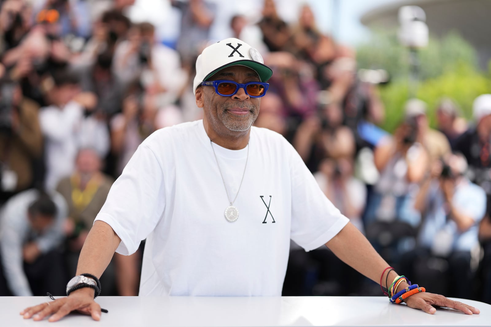 Director Spike Lee poses for photographers at the photo call for the film 'Highest 2 Lowest' at the 78th international film festival, Cannes, southern France, Monday, May 19, 2025. (Photo by Lewis Joly/Invision/AP)