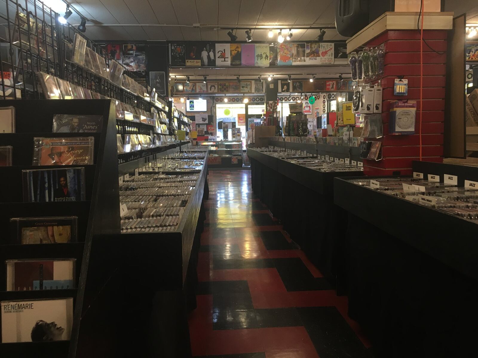 Omega Music in Dayton is celebrating 35 years. ALEX PERRY/STAFF