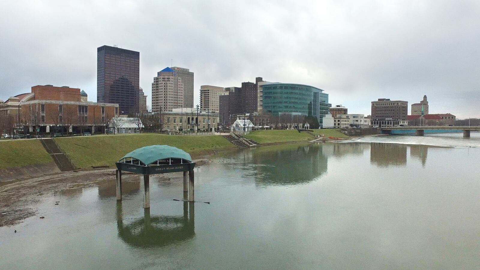 The Great Miami River, which is not at flood stage, is running high. Many stretches of the bike paths near downtown Dayton are covered with water. TY GREENLEES / STAFF