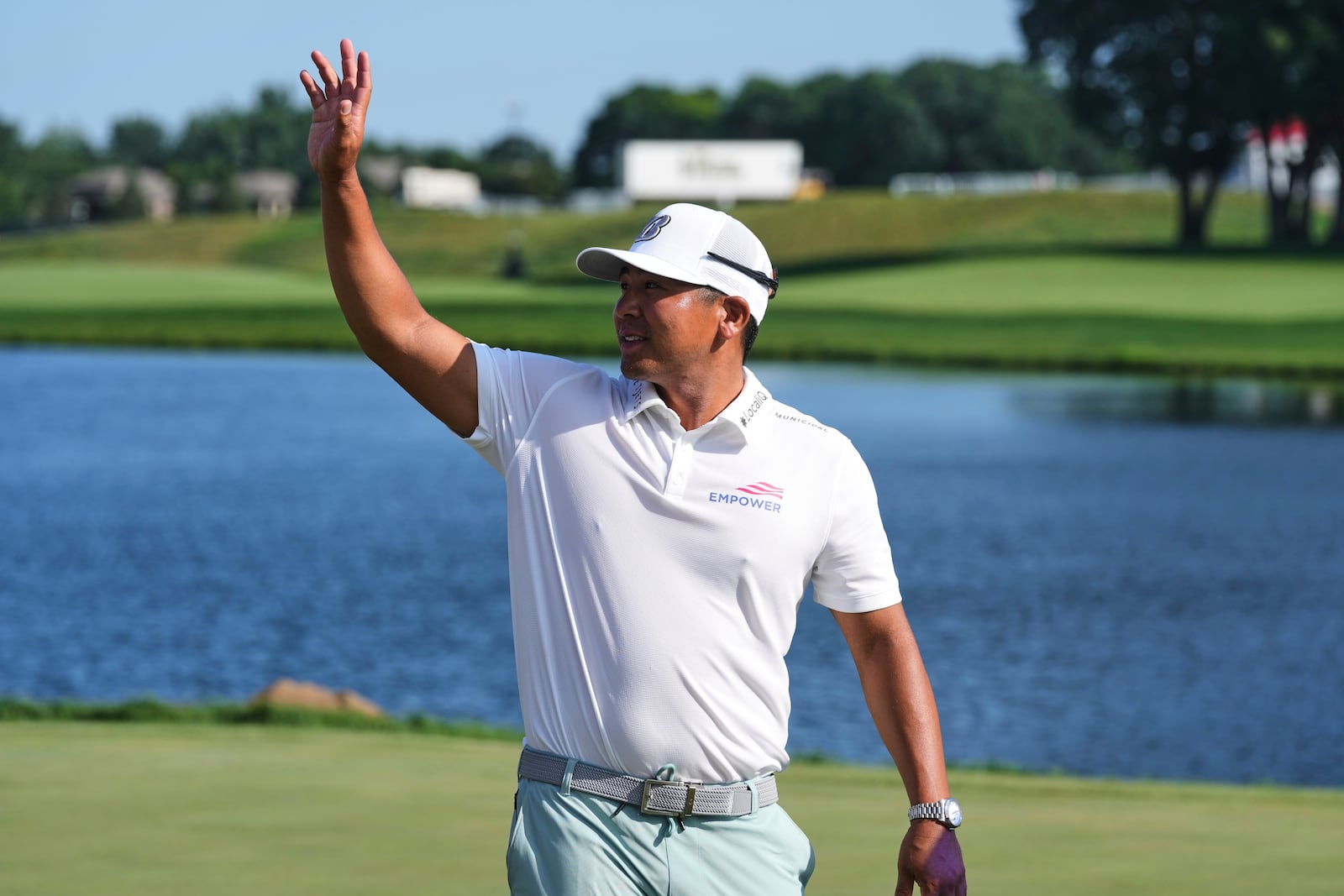 Kurt Kitayama arrives for a trophy ceremony after winning the 3M Open golf tournament at the Tournament Players Club Sunday, July 27, 2025, in Blaine, Minn. (AP Photo/Abbie Parr)