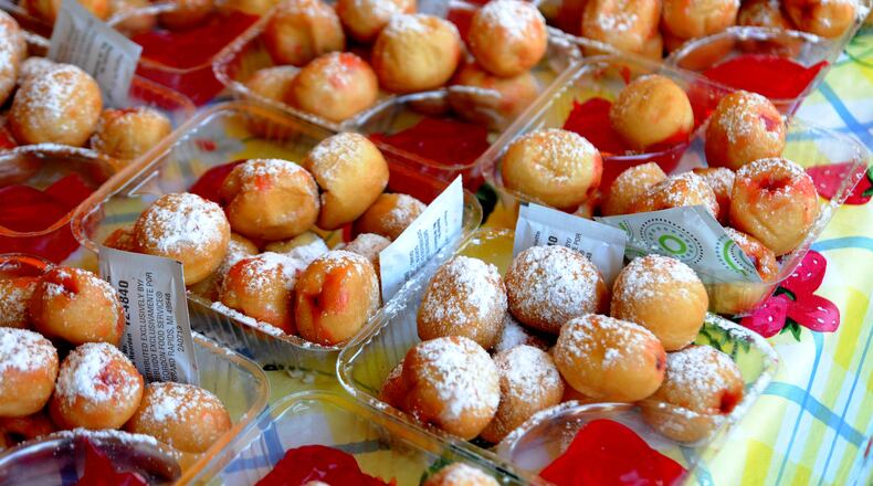 A smaller scale Strawberry Jam downtown on July 4 and July 5, 2021, will feature music and food only after the Troy Strawberry Festival was canceled for the second time due to the coronavirus pandemic. Pictured ae strawberry sweets from last festival, the 2019 Troy Strawberry Festival that took place June 1-2, 2019, in downtown Troy around the Public Square and along the Great Miami River levee. Festival-goers enjoyed strawberry treats, festival eats and shopped and hundreds of booths. DAVID MOODIE/CONTRIBUTED