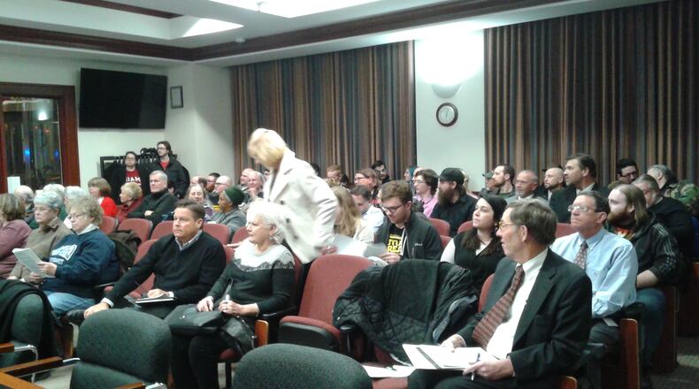 A crowd of mostly professional wrestlers and their fans filled Hamilton’s city council chambers Wednesday and clapped after the Hamilton Planning Commission unanimously approved Friday-evening wrestling events on a 90-day trial basis. MIKE RUTLEDGE/STAFF