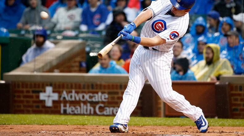 Chicago Cubs’ Kyle Schwarber hits a home run off San Francisco Giants starting pitcher Johnny Cueto during the first inning of a baseball game Tuesday, May 23, 2017, in Chicago. (AP Photo/Charles Rex Arbogast)