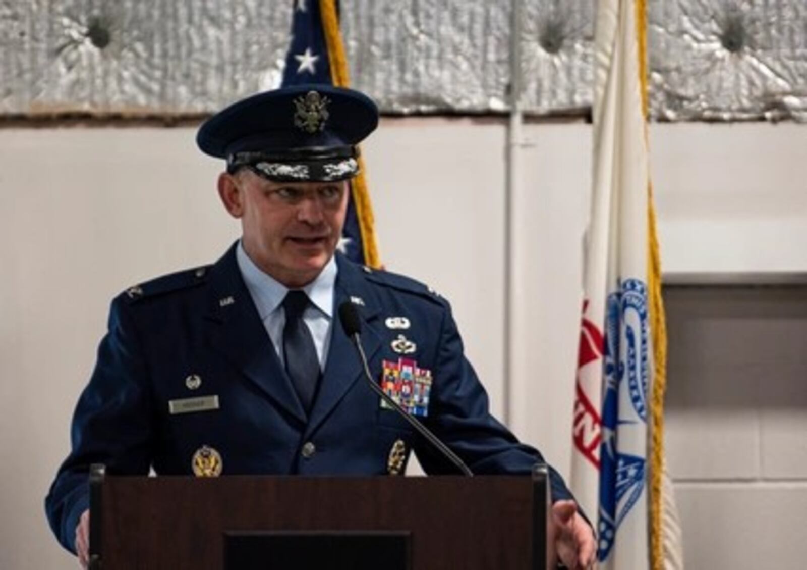 Col. Christopher Meeker, then the 88th Air Base Wing and installation commander, spoke during the Honor Guard Graduation Ceremony on April 17, 2023, at Wright-Patterson Air Force Base. Air Force photo