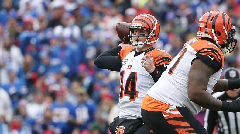 ORCHARD PARK, NY - OCTOBER 18: Andy Dalton #14 of the Cincinnati Bengals looks to throw against the Buffalo Bills during the first half at Ralph Wilson Stadium on October 18, 2015 in Orchard Park, New York. (Photo by Tom Szczerbowski/Getty Images)