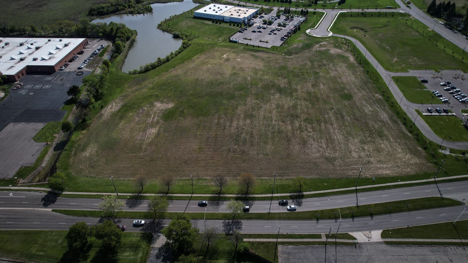 The Dayton Regional STEM School plans build a 58,000 square foot elementary school off Woodman Drive in Miami Valley Research Park. The existing STEM school building is at the left edge of the photo. Jim Noelker/ Staff