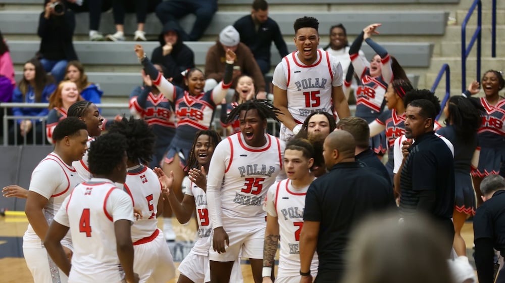 Northridge celebrates a victory against Margaretta at the Beacon Orthopaedics Flyin’ To The Hoop on Monday, Jan. 19, 2026, at Trent Arena in Kettering. David Jablonski/Staff